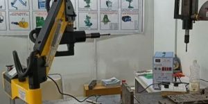 Robotic Arm Tapping Machine