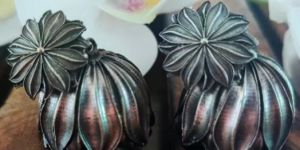 Silver Toned Floral Jhumka Earrings