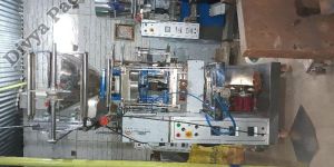 Half Pneumatic Pouch Packing Machine