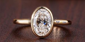 Graceful Oval Cut Diamond Yellow Gold Ring