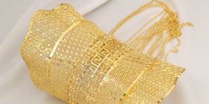 Radiant Gold Filigree Kada with Sun Motif