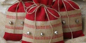 Hand Embroidered Jute Pouches with Drawstring and Beautifully Star Woven Design in Red Color