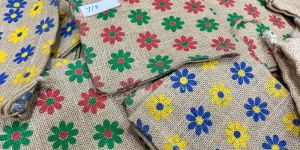 Stylish Flower Printed Natural Jute Pouch for Shopping Elegant Eco-Friendly Bags .