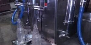 Semi Automatic Volumetric Liquid Bottle Filling Machine