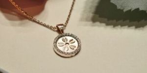 Sunburst Pendant Necklace with Diamond Accents