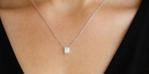 Timeless Solitaire Pendant with 0.71 CT Emerald Cut Diamond