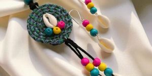 Boho Tides: Handcrafted Fabric Pendant