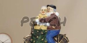 Romantic Dada Dadi Love Couple Statue On Cycle