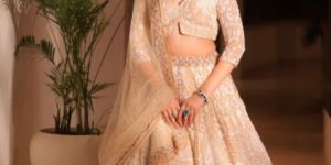 DAZZLING GOLD NET WOMEN LEHENGA