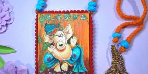 Women Jai Ganesh Handcrafted Fabric Necklace With Woven Bead