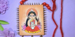 Women Maa Laxmi Handcrafted Fabric Necklace With Plastic Bead Charm