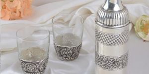 Water Bottle With A Pair of Glasses