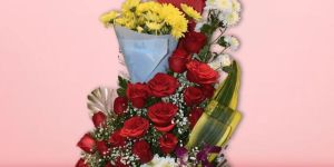 magnificent mix of roses cherry blue orchids bouquet