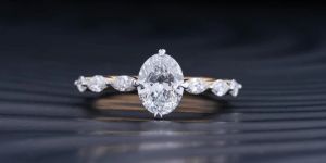 Oval Diamond Ladies Ring With Marquise Side Stones