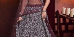 Women Wine Purple Net Lehenga Choli with Sequence and Zarkan Work