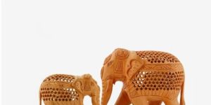 5 Inch Under Cutting Wooden Elephant Pair Statues
