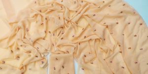 Women Faux Georgette With Sunflower Embroidery Work Saree