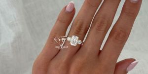 Elongated Cushion Cut and Round Cut Diamond Three Stone Wedding Ring