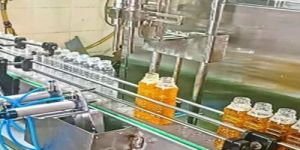 Oil Bottle Packing Machine