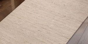 plain beige hand made jute rug