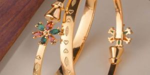 Pink Stone Flower Shaped Artificial Golden Bracelet