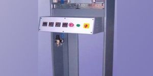 Toe Puff Attaching Machine