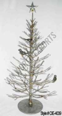 Silver Metal Christmas Tree Sculpture with Ornate Branches and Star Topper