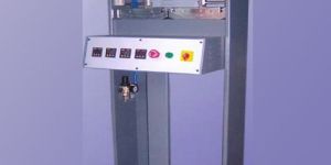 Toe Puff Attaching Machine