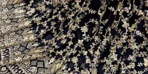 embroidered net fabrics golden jari sequence work lehenga