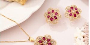 Gold Stud with Precious Stone