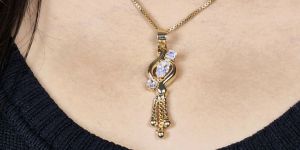 AD Gold-Tone Drop Pendant