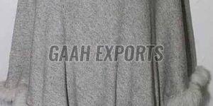 Fur and Leather Tussle Poncho