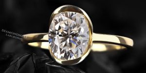 Oval Cut Diamond Half Bezel Engagement Ring