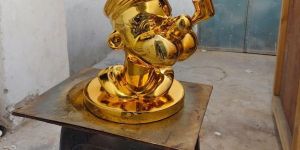 Poppy Face Sculpture
