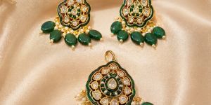 gold plated green kundan pendent set