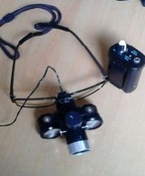 surgical loupes with rechargeable LED illumination 3.8v.