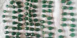 DYED BERYL SIDE DRILL FACTED DROPS