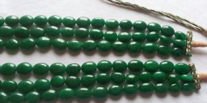 OVAL SMOOTH DYED BERYL BEADS