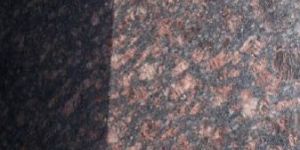 TEN BROWN GRANITE SLABS