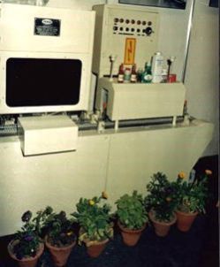 Automatic Neck Band Sleeve Applicator.