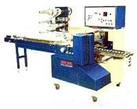 Flow Wrap Packaging Machine :-
