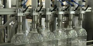 FOUR HEAD Bottle Filling Machine