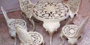 Lion Leg Floral Cast Metal Dining Set