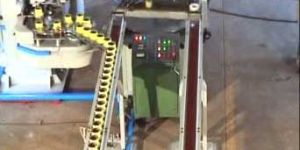 MACHINERY FOR ASSEMBLY AND SEAMING OF AUTOMOTIVE FILTERS