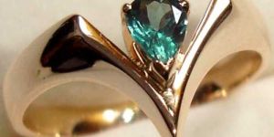 Ladies Teardrop Cut Emerald Designer Ring