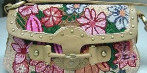 floral print leather saddle bag