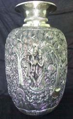 Silver Statues with Utensils