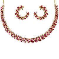 Ruby Studded Gold Jewelry