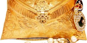 Embossed Gold Clutch Bag with Peacock Pearl Drop Tassel